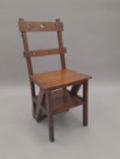 A Victorian metamorphic library chair. 39 cm wide.