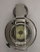 A military interest compass by Stanley of London, the case inscribed Nigeria Conroy 1976.