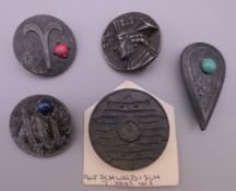 Five military interest badges ''Tinnies''.