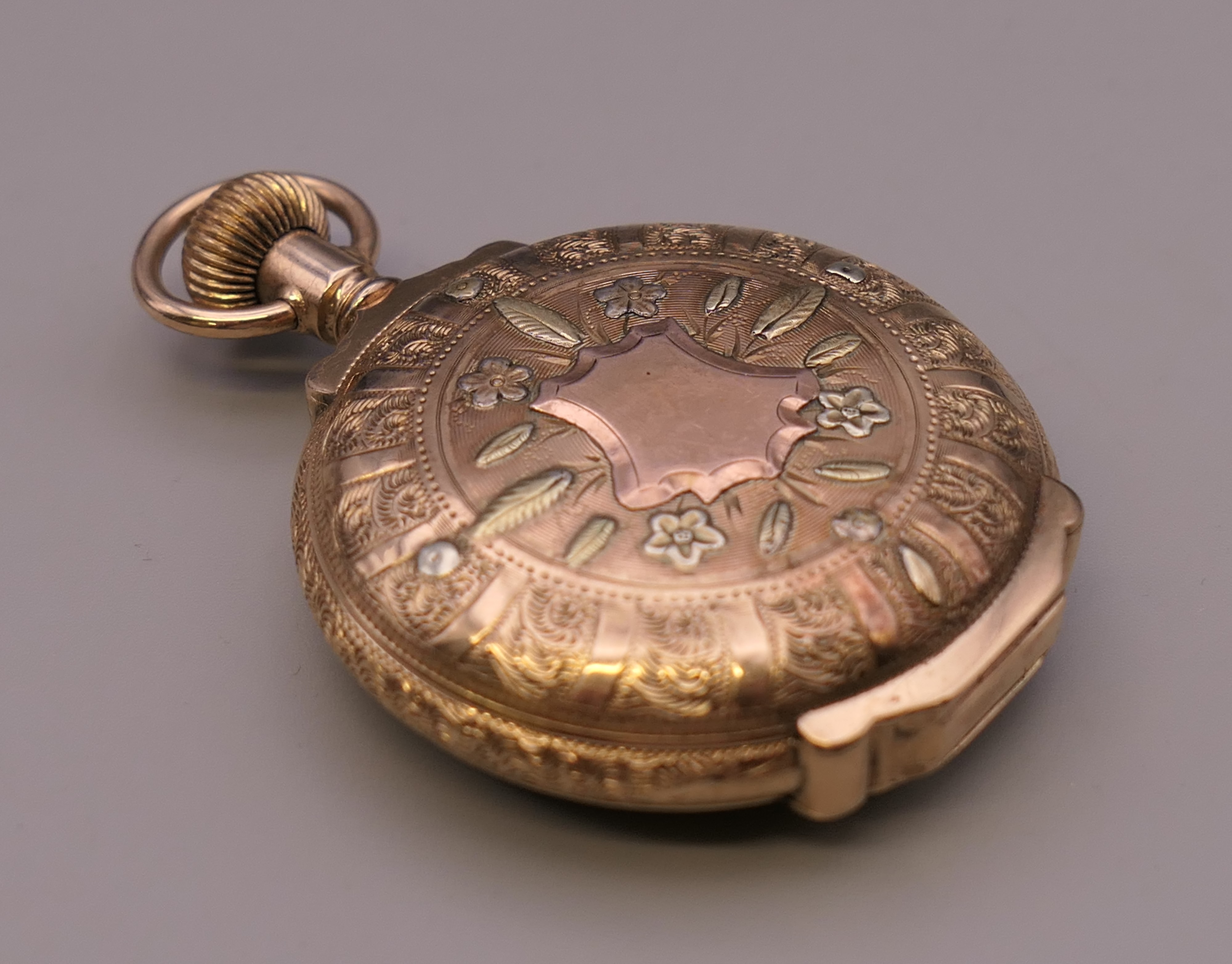 A 14 ct gold multi colour pocket watch. 4 cm wide. - Image 4 of 10