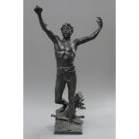 A bronze model of a young man with a sword at his feet. 51 cm high.