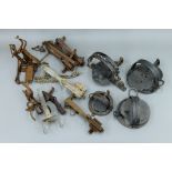 A collection of antique animal traps and snares, etc.