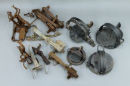 A collection of antique animal traps and snares, etc.