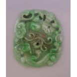 A Chinese apple green jade carving. 8.5 cm long.