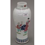 A Chinese famille rose porcelain vase decorated with children in a garden,