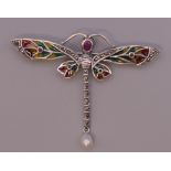 A silver plique a jour dragonfly brooch. 7 cm wide.