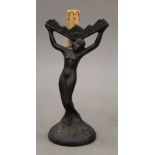 An Art Deco style figural lamp base. 26 cm high.