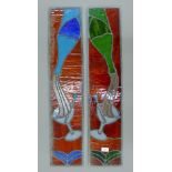 A pair of lead glazed stained glass panels. 18 x 85 cm.