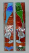 A pair of lead glazed stained glass panels. 18 x 85 cm.