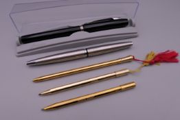 A quantity of pens and pencils, including a Parker with 14 K gold nib.