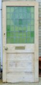 Three vintage lead glazed pine doors.