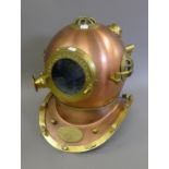 A large replica diver's helmet. 43 cm high.