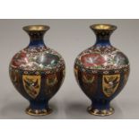 A pair of cloisonne vases. Each 21 cm high.