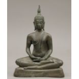 A bronze model of Buddha. 17.5 cm high.