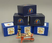 Eight boxed extra-large Colour Box miniature teddy bears, with collector's badges.