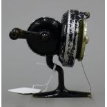 A Helical Casting Reel Co fixed spool casting reel, 1930's, single finger pick-up flyer,