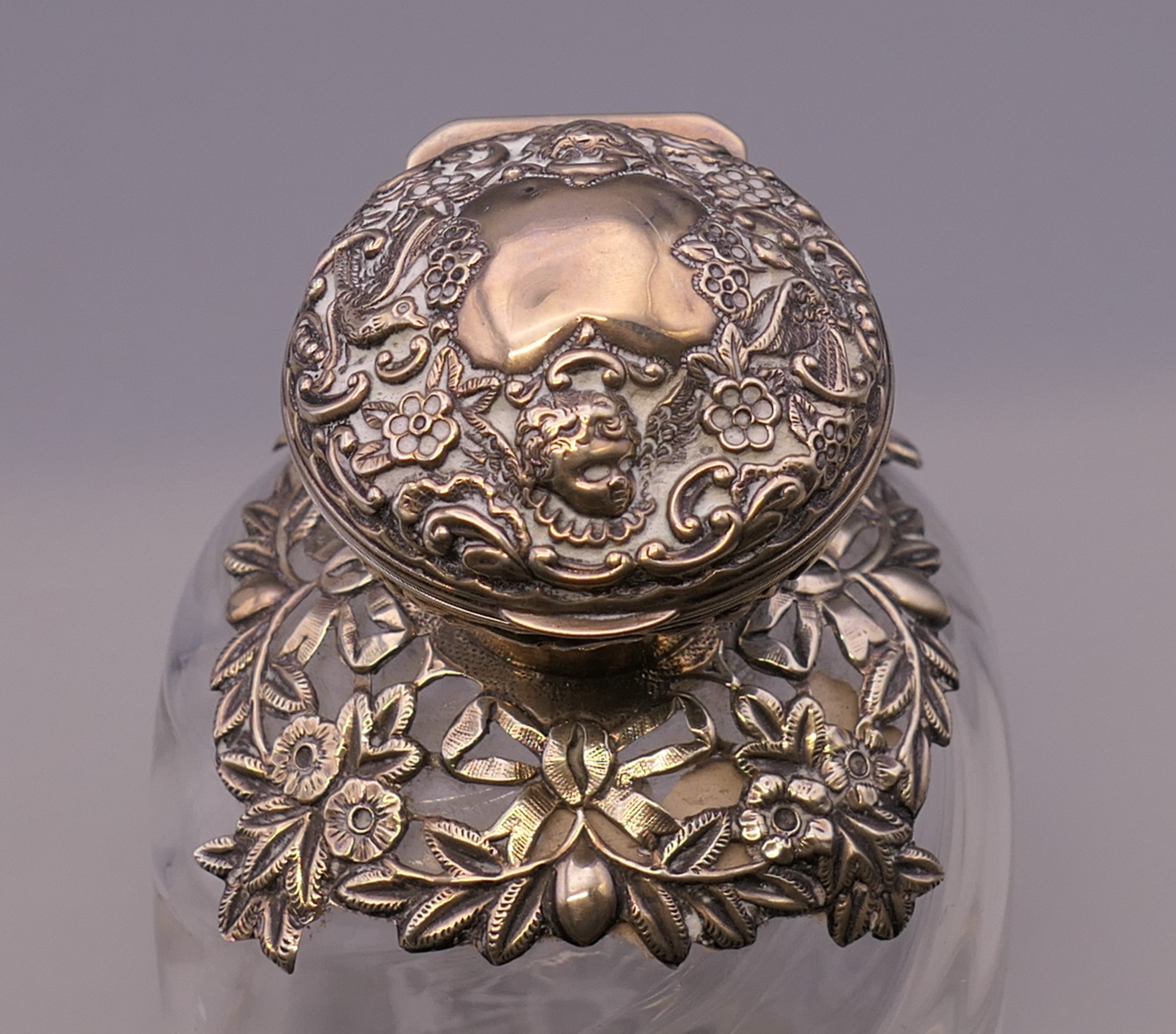 A silver topped bulbous perfume bottle. 12 cm high. - Image 5 of 7