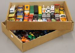 A quantity of vintage Matchbox and Hot Wheels model vehicles.