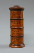 A wooden spice tower. 19.5 cm high.