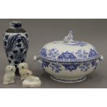 A quantity of porcelain, including three Staffordshire dogs,