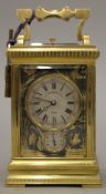 A 19th century French brass cased repeating alarm carriage clock.
