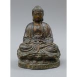 A lacquered bronze model of Buddha. 21 cm high.