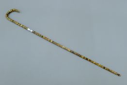 A Victorian horn segmented walking stick. 90 cm long.