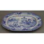 A 19th century blue and white porcelain meat plate. 47 cm long.