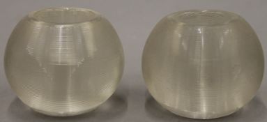 Two ribbed glass match strikers. Each 5.5 cm high.