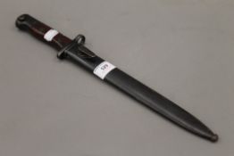 A bayonet. 39 cm long.