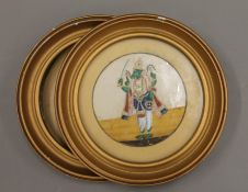 A pair of framed Indian miniatures. Each 21.5 cm diameter overall.