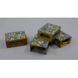 Four cloisonne matchbox holders. Each 4.5 cm long.