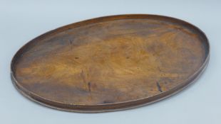 A 19th century mahogany oval tray. 73 cm wide.