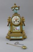 A 19th century Continental porcelain mounted mantle clock. 37 cm high.