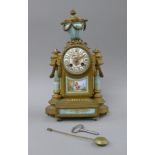 A 19th century Continental porcelain mounted mantle clock. 37 cm high.