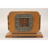 An Art Deco mantle clock. 33.5 cm wide.