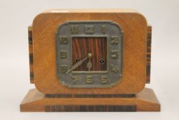 An Art Deco mantle clock. 33.5 cm wide.