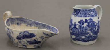 A blue and white sparrow beak jug and a cream boat. The former 6.5 cm high.