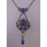 A Norwegian silver blue enamel pendant necklace by Marius Hammer 1910. The pendant 5 cm high.