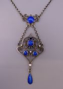 A Norwegian silver blue enamel pendant necklace by Marius Hammer 1910. The pendant 5 cm high.