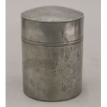 A Chinese pewter tea caddy chased with dragon and birds. 13.5 cm high.