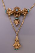 A Victorian unmarked high ct gold turquoise, pearl and diamond pendant necklace. 41 cm long. 13.