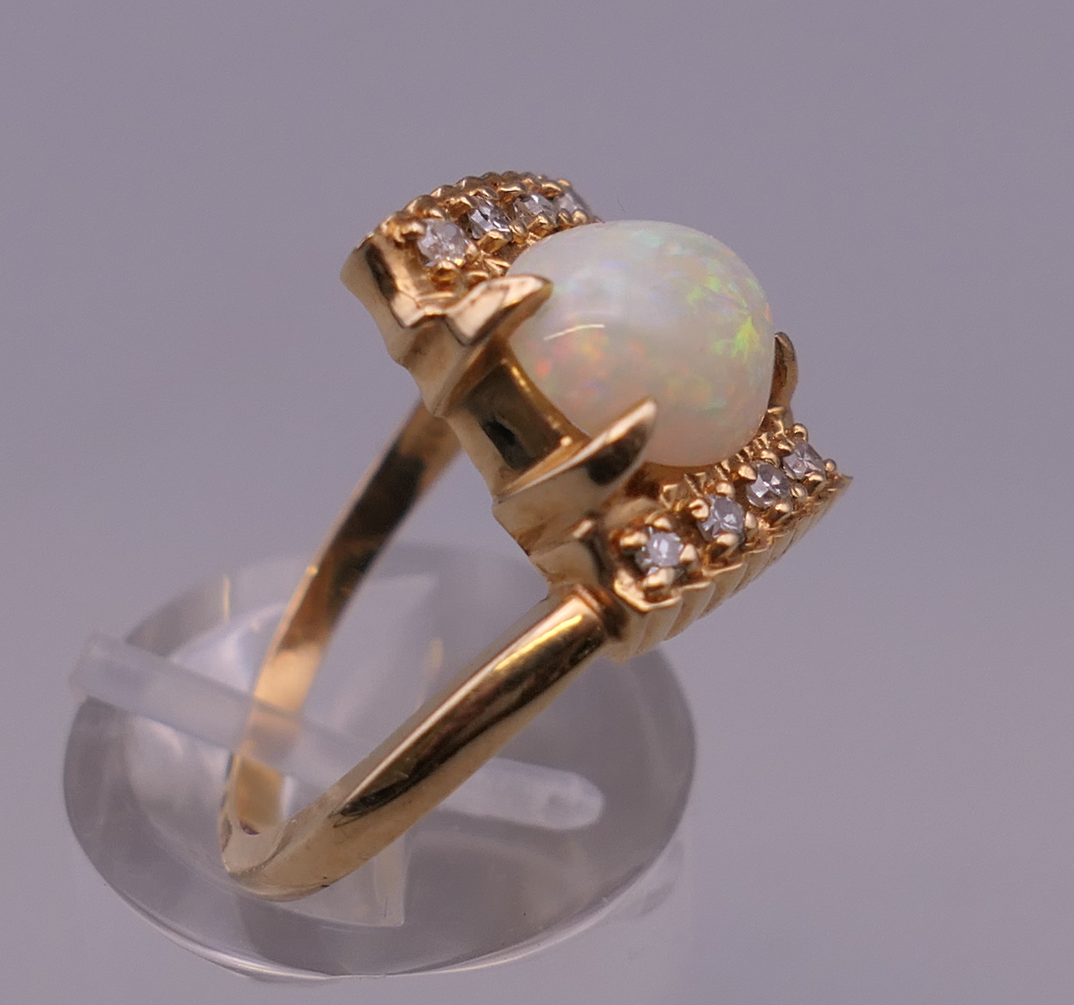 A 14 ct gold opal and diamond ring. Ring N/O. 4.8 grammes total weight. - Image 2 of 6