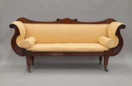 A 19th century upholstered mahogany settee. 192 cm long.