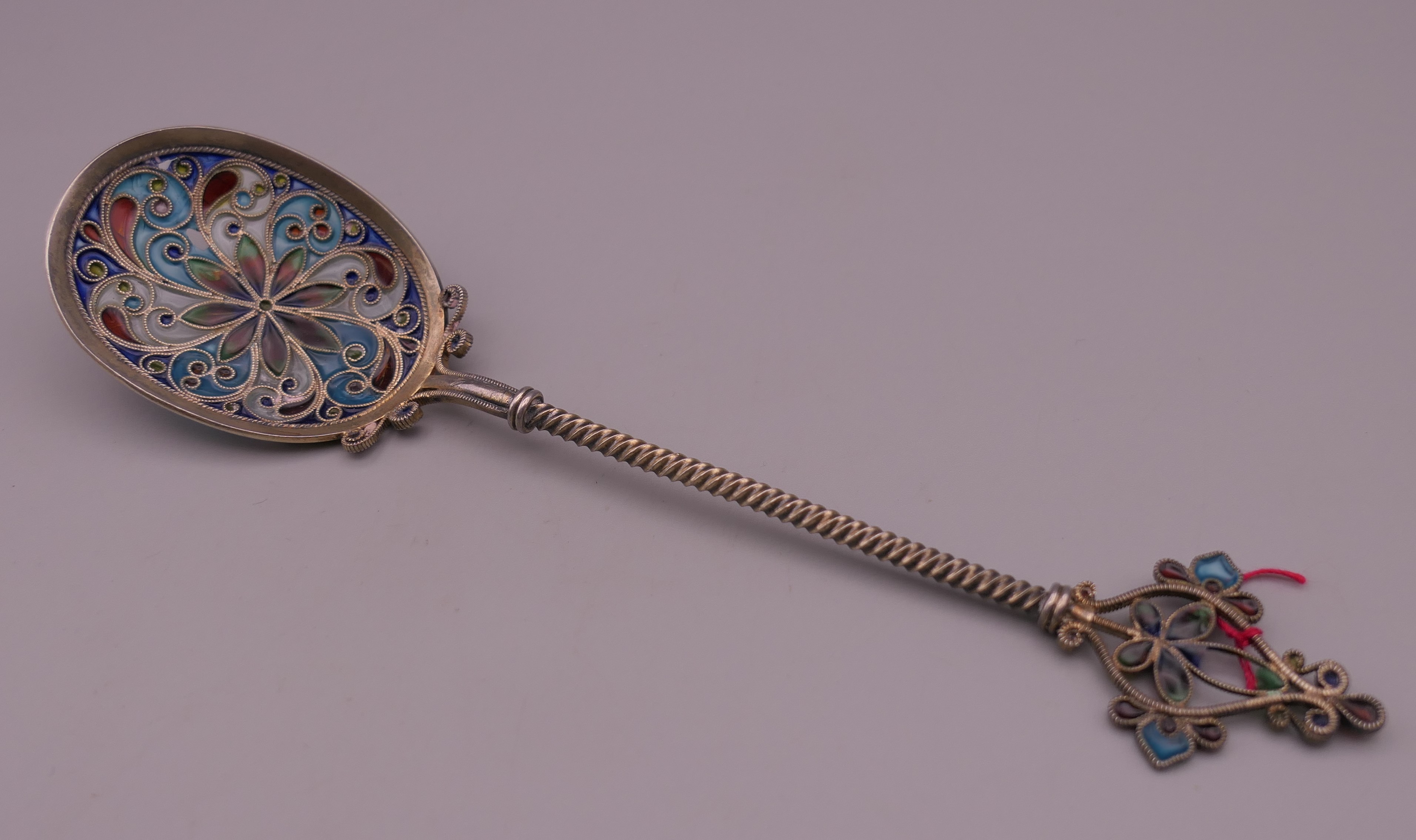 An unmarked silver filigree plique a jour spoon. 16.5 cm long. - Image 2 of 6