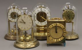 Five various anniversary clocks.