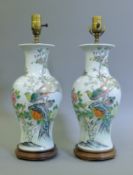 A pair of Chinese Republican porcelain vases, fitted as lamps. 49 cm high overall.