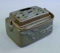 A Chinese rectangular bronze and silver inlaid handled censer. 21 cm wide.