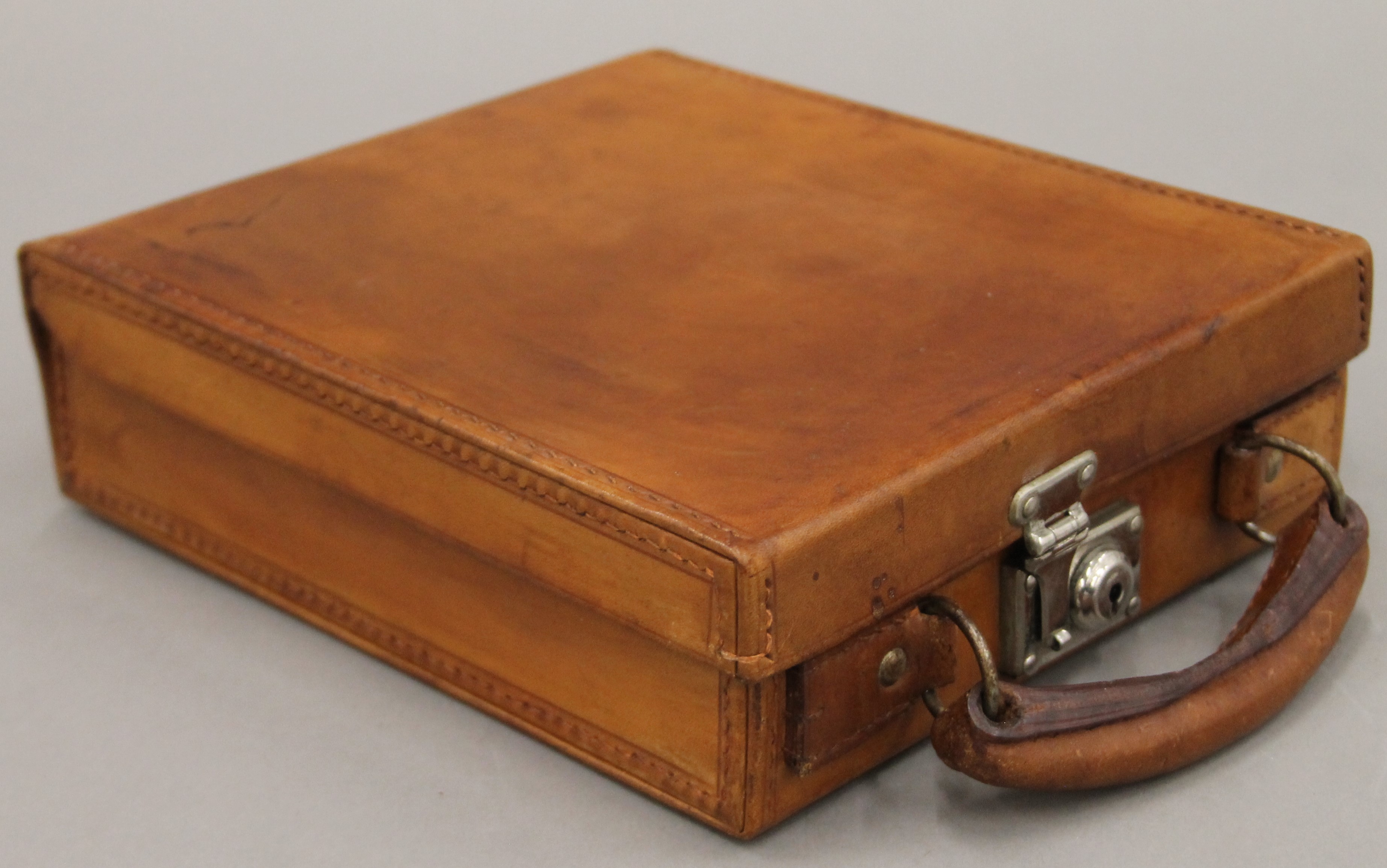 Two bottles housed in a leather case. The case 20 cm wide. - Image 4 of 8