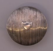 A Dutch silver pill box. 5 cm diameter. 18.9 grammes.